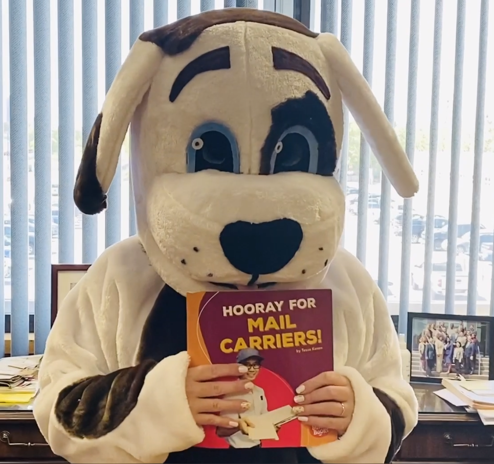 Storytime: Sammy the Safety Dog from the U.S. Postal Service reads Hooray for Mail Carriers by Tessa Kenan